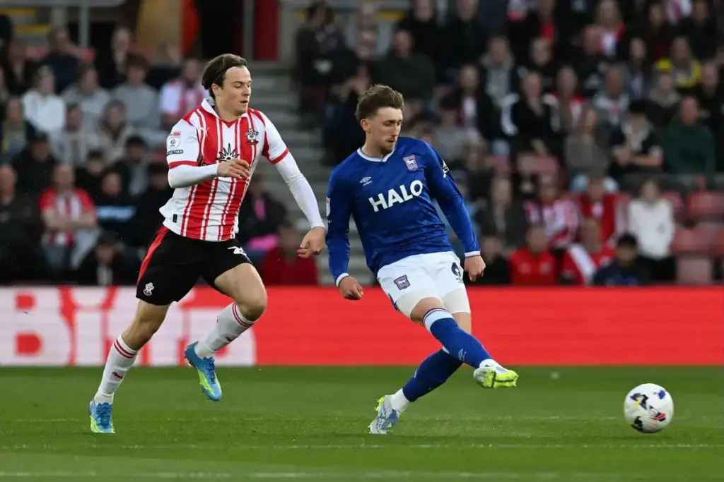 Dan Neil (6) of Ipswich Town on the attack battles for possession with Caspar Jander (20) of Southampton during the EFL Sky Bet Championship match between Southampton and Ipswich Town at the St Mary's Stadium, Southampton, UK on 28 April 2026.