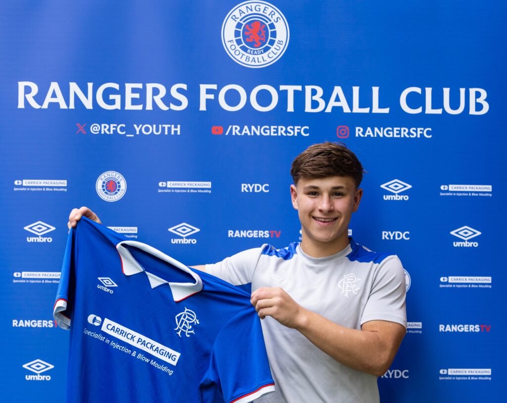 Kyle Glasgow signs a Rangers contract as part of the club's academy pathway