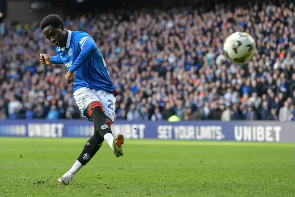 Djeidi Gassama and Oliver Antman on the Rangers bench against St Etienne