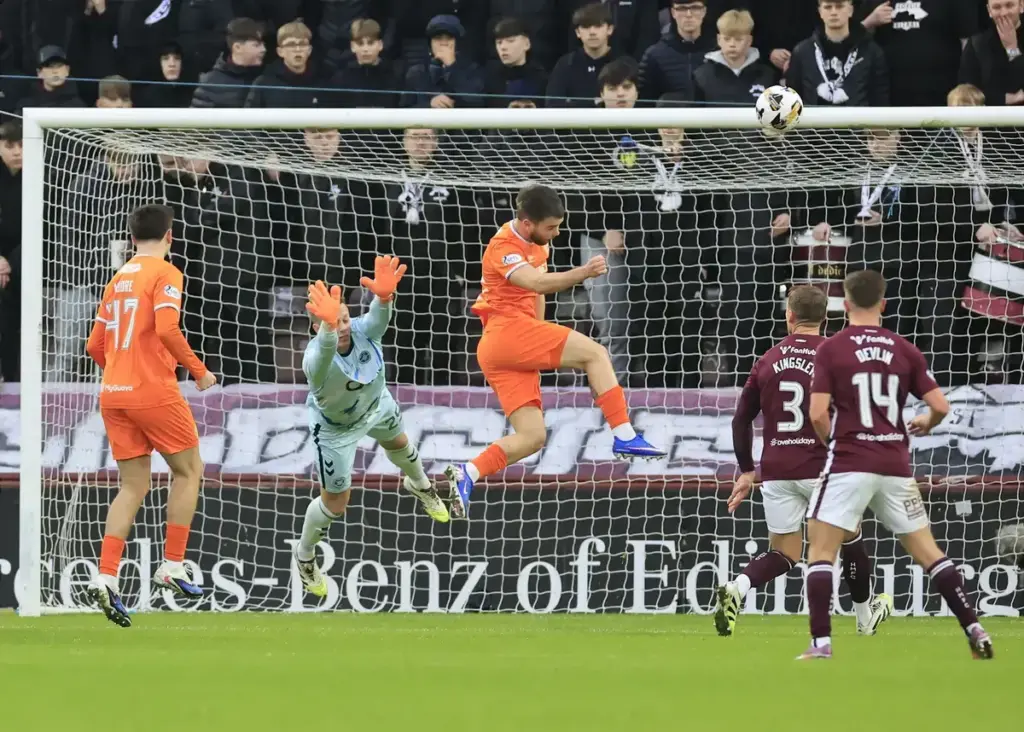 Bailey Rice of Rangers (middle) heads a shot over the bar during the William Hill Premiership match at Tynecastle Park, Edinburgh
21/12/2025