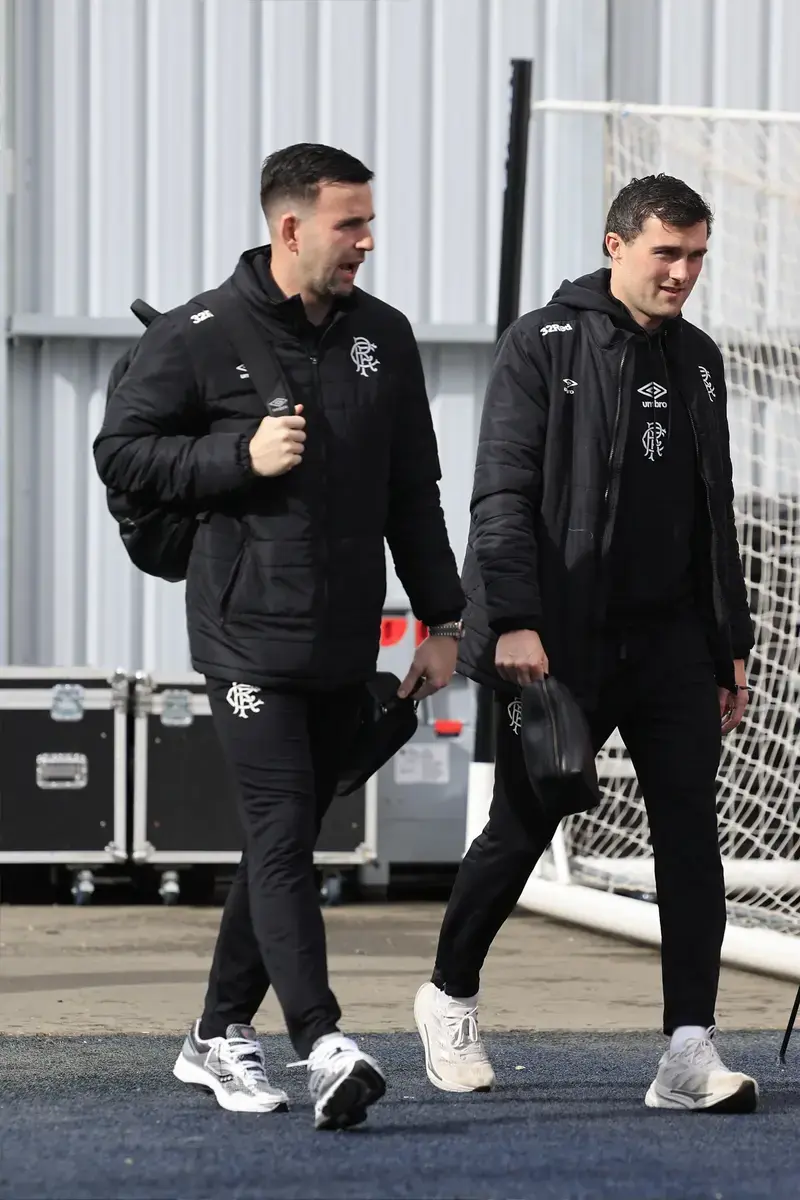 Liam Kelly of Rangers (left) and John Souttar of Rangers arrives at the stadium during the William Hill Premiership match at the Falkirk Stadium, Falkirk 12/04/2026