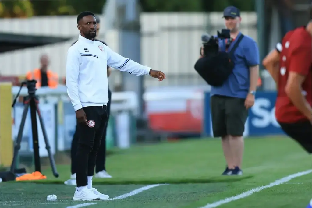 Woking manager Jermain Defoe during the Pre-Season Friendly match between Woking and Portsmouth at the Kingfield Stadium, Woking, UK on 14 July 2026.