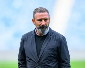 Rangers boss Derek McInnes on the Ibrox pitch.